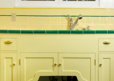 Sink cabinet in historic yellow kitchen