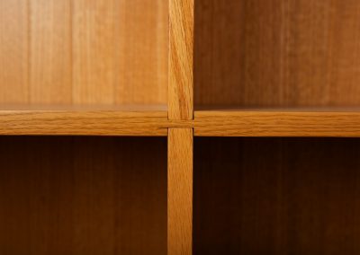 Handcrafted details on custom bookcase in San Diego
